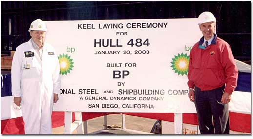 The keel laying for Hull 484 took place in January 2003. Robert McRae (L), BP Site Team Manager, welded his initials into the keel to signify the start of construction. Standing with McRae is Jim Scott, NASSCO's Vice President of Marketing and Business Affairs.