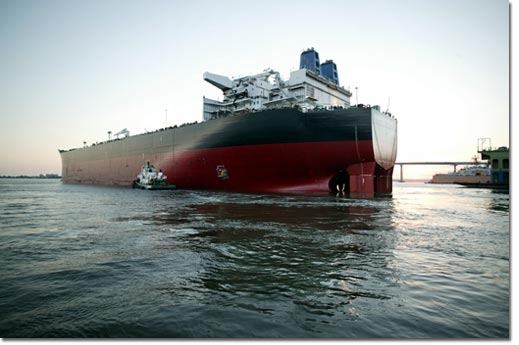 The ship is turned in the bay for dockside berthing, where construction continues. The float out took place on July 2, 2004, and Hull 485 will be delivered in 2005.