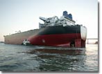 The ship is turned in the bay for dockside berthing, where construction continues. The float out took place on July 2, 2004, and Hull 485 will be delivered in 2005.