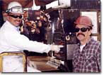 BP Team Member Jeff Gonzales uses a welding machine to cut the first piece of steel for Hull 486, signifying the start of construction on the Alaskan Navigator.  Gonzales is being assisted by NASSCO's Raul Gil.