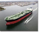 The Alaskan Frontier leaves San Diego Bay and the downtown skyline behind as it heads out to sea and begins its first voyage. The ship was delivered to BP in August 2004.