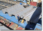 A corrugated bulkhead for PC-1 undergoes pre-outfit construction at NASSCO.