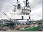 The 565-ton House block is lowered into place on the Sunshine State.