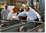 Mr. Gentile measures the first steel part cut for Hull 503.jpg