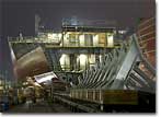 A night view of T-AKE 3 on the building ways.