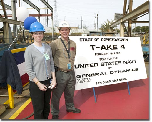 Sally Smith, spouse of Jeff Smith, ship design manager for the Naval Sea Systems Command, Arlington, Va., cut the first steel plate to signify the start of construction of the T-AKE 4 dry cargo/ammunition ship.&nbsp;Posing with her is Graham Dodd, NASSCO's Director of Steel.