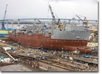 Broadside view of USNS Charles Drew (T-AKE 10) under construction.