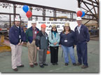 Mrs. Tessie Nazal (3rd from right) is the honoree at the March 19, 2009 Start of Construction ceremony for T-AKE 11.