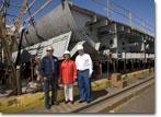 Ship Sponsor Mrs. Loretta Penn stands in front of a T-AKE 11 keel block on June 6, 2009.