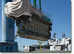 The last engine is lifted into place on the USNS Medgar Evers (T-AKE 13) in March of 2011. 