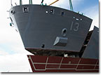 T-AKE 13, USNS Medgar Evers, as its bow is set into place in April of 2011. 