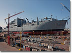 T-AKE 13 on October 24, 2011, as it nears completion at NASSCO, with the US flag in place.