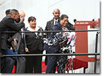 Champagne bottle breaks against the USNS Medgar Evers as it is christened by Mrs. Myrlie Evers on November 12, 2011.