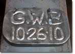 Mrs. Buzby's initials welded onto the keel inside the USNS Medgar Evers.