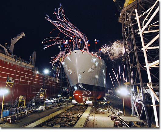The nighttime launch of T-AKE 4 on May 15, 2007 (U.S. Navy photo).