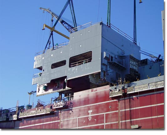 A superstructure block is lifted aboard the Richard E. Byrd.