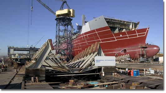 T-AKE 4 (right) and T-AKE 5 under construction at the NASSCO Shipyard in January 2007.