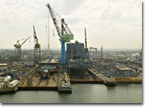 T-AKE 6 (left) and T-AKE 5 under construction at the NASSCO shipyard in July 2007.