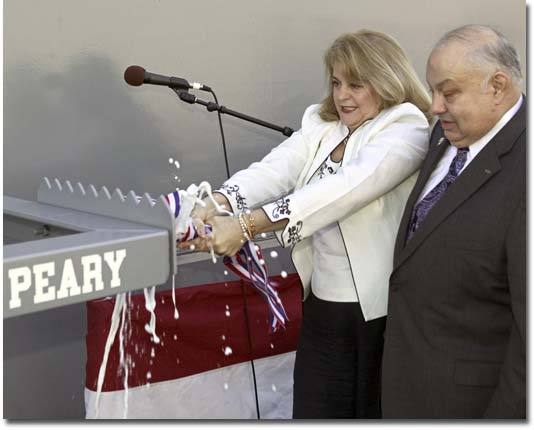 As NASSCO President Fred Harris looks on, Florida Circuit Court Judge Peary Fowler christens USNS Robert E. Peary (T-AKE 5) on February 9, 2008.