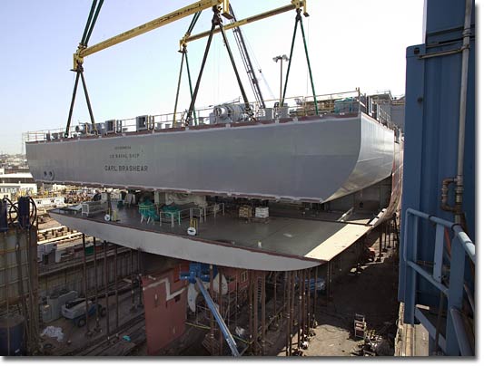 A stern block with the ship's name is placed aboard T-AKE 7 on April 25, 2008.
