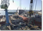  A grand block is lifted onto T-AKE 7 on January 22, 2008.