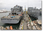 T-AKE 8 shares the outfitting pier with T-AKE 7 at NASSCO in March 2009.