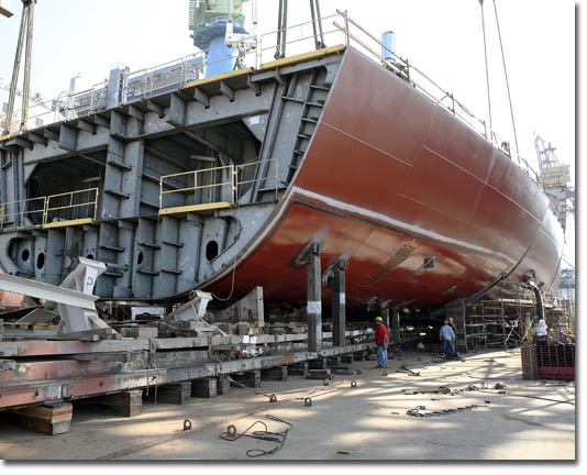 A forward hull section of T-AKE 8 is put into position on June 27, 2008.