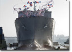 The launch of USNS Matthew Perry (T-AKE 9) at the General Dynamics NASSCO shipyard on August 16, 2009.