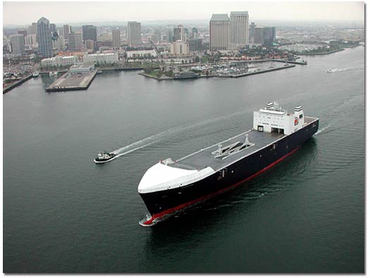 With the downtown skyline as a backdrop, the M.V. Midnight Sun sails out of San Diego Harbor to conduct a series of successful sea trials in March 2003.