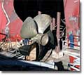 One of two giant propellers is installed on the M.V. North Star.  Four diesel-electric engines will power the trailership to speeds of more than 24 knots.