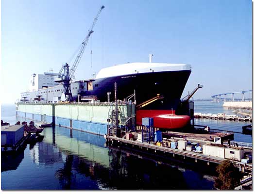 The freshly painted Midnight Sun receives some finishing touches in NASSCO's drydock.