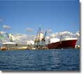 A photographer on a boat in&nbsp;San Diego Bay has captured "Twin TOTEs," with construction on the M.V. Midnight Sun (r) continuing dockside and construction on the M.V. North Star (l) in NASSCO's drydock.  The North Star is being prepared to be floated out to join her sister ship in the Bay.